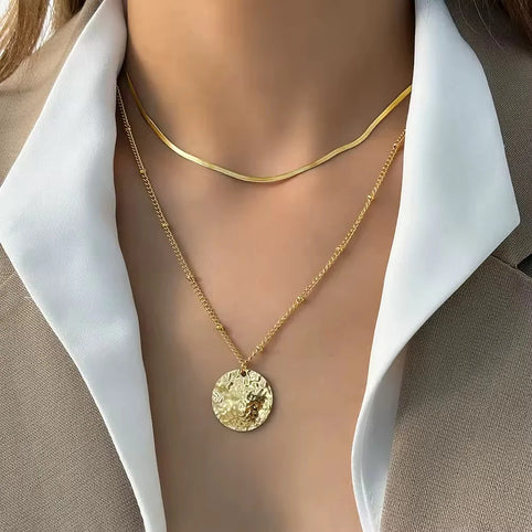 Colgantes de medalla: el clásico que nunca falla y siempre renace