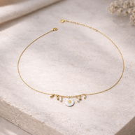 Colgante dorado círculos blancas