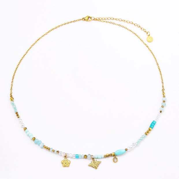 Colgante dorado piedras azules y abeja