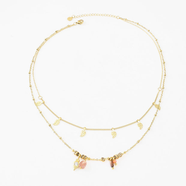 Colgante dorado doble con hojas y piedras corales