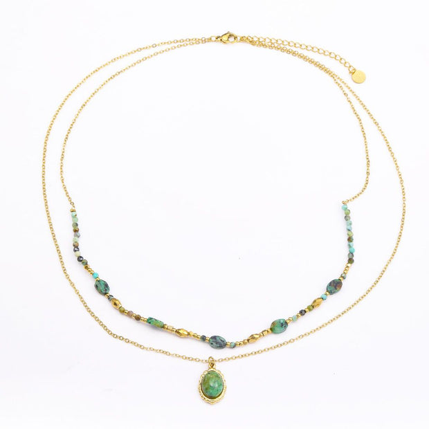 Colgante dorado doble piedras aguamarinas jaspeadas