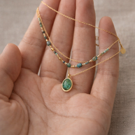 Colgante dorado doble piedras aguamarinas jaspeadas