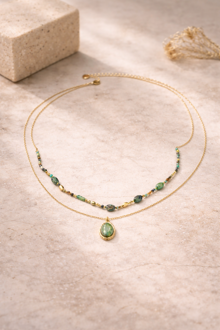 Colgante dorado doble piedras aguamarinas jaspeadas