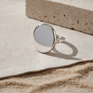 Anillo plateado con disco