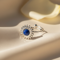 Anillo plateado con piedra sol