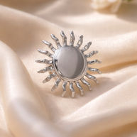 Anillo plateado de sol