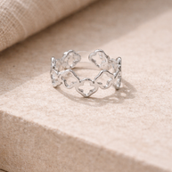 Anillo plateado flores caladas