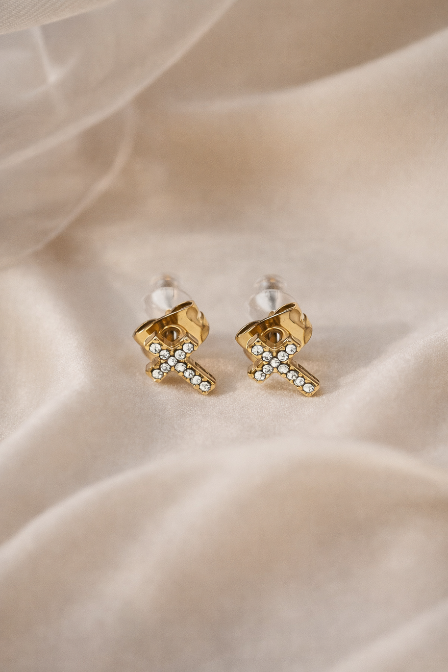 Pendientes de cruz dorada con circonitas