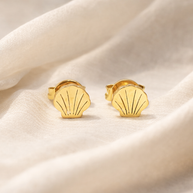 Pendientes dorados de concha