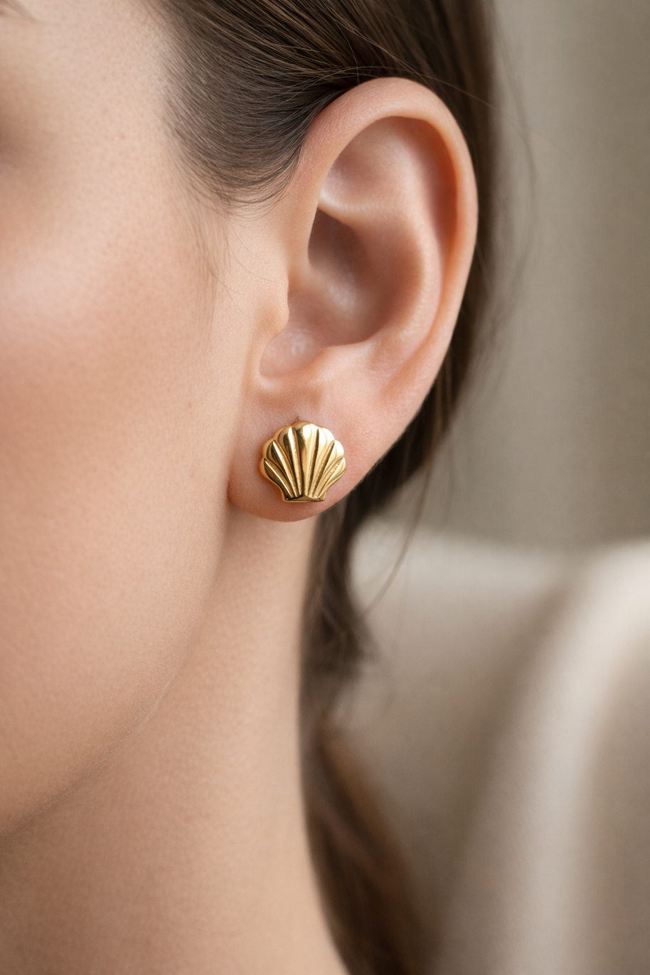 Pendientes dorados de concha