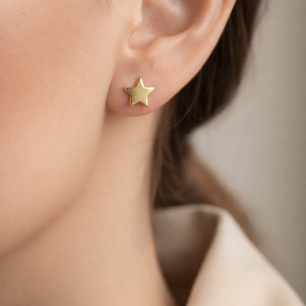 Pendientes estrella dorada