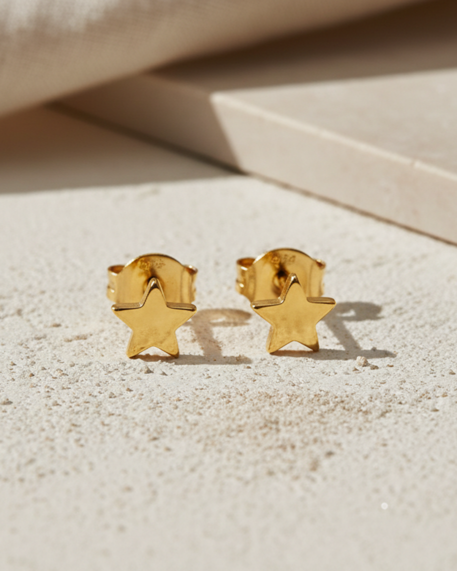 Pendientes estrella dorada
