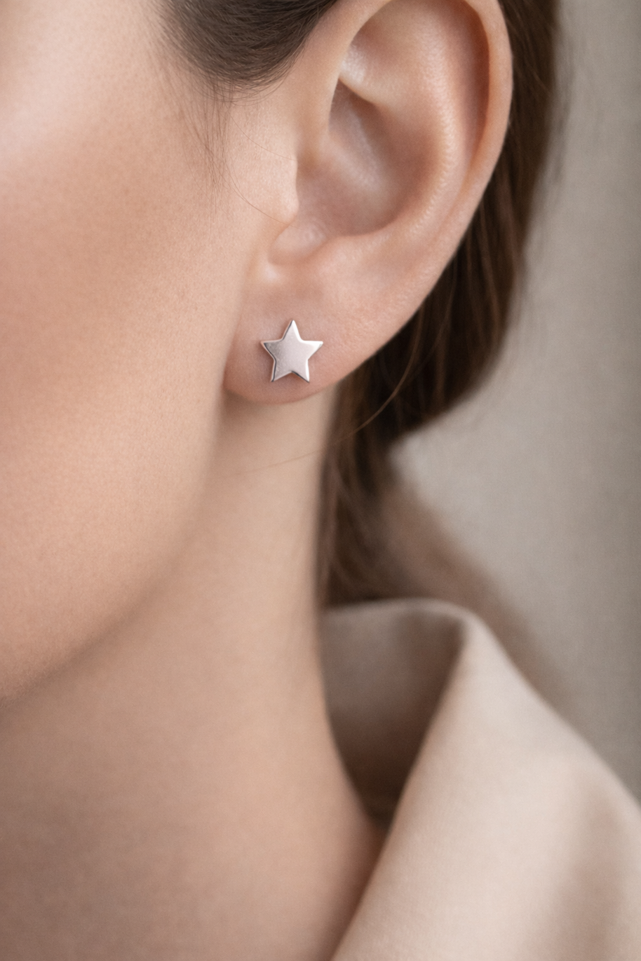 Pendientes estrella plateada