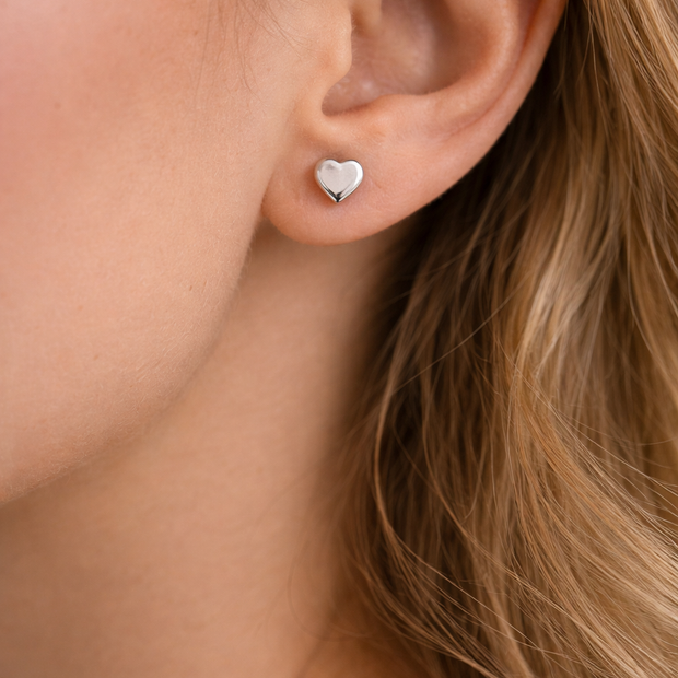 Pendientes plateados de corazón