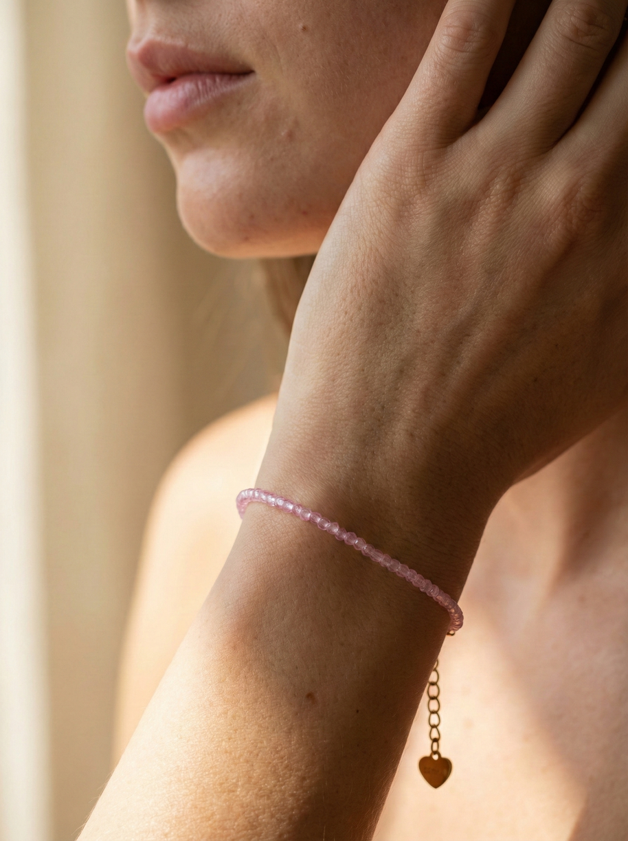 Pulsera dorada piedras rosas