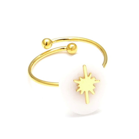 Anillo abierto dorado con detalle estrella y piedra ovalada