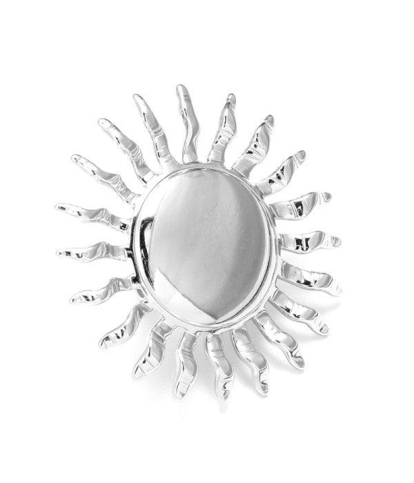 Anillo plateado de sol.