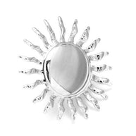 Anillo plateado de sol.