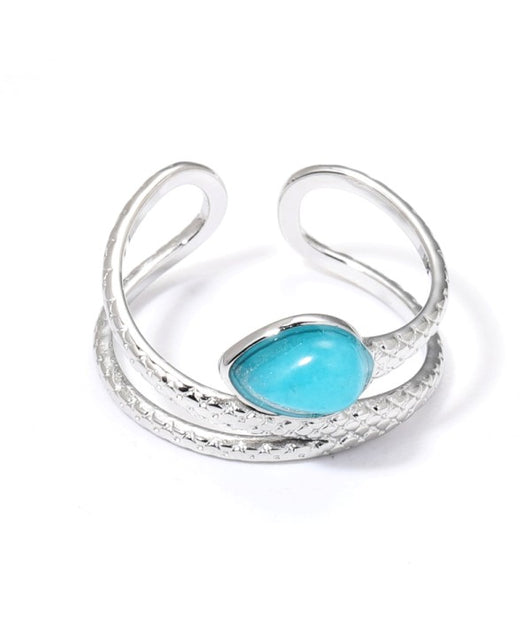 Anillo plateado con piedra azul
