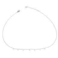 Collar plateado con colgantes de lunas.