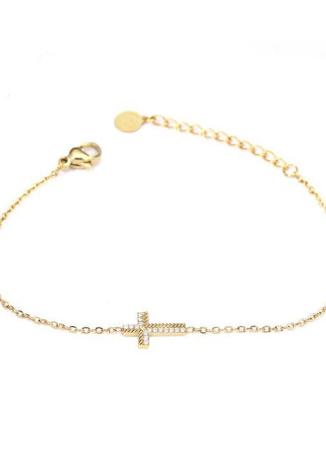 Pulsera dorada con cruz y circonitas.