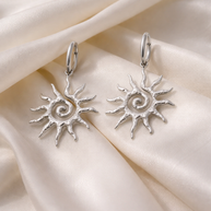 Pendientes plateados sol espiral
