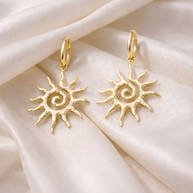 Pendientes dorados sol espiral