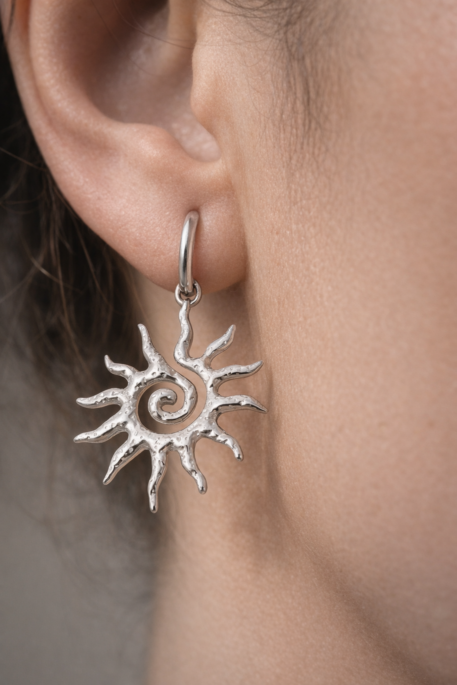 Pendientes plateados sol espiral