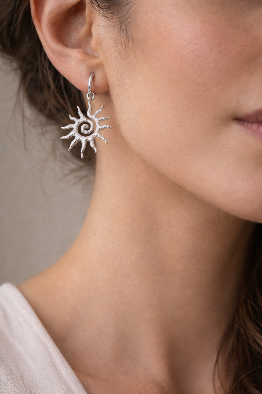 Pendientes plateados sol espiral