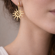 Pendientes dorados sol espiral
